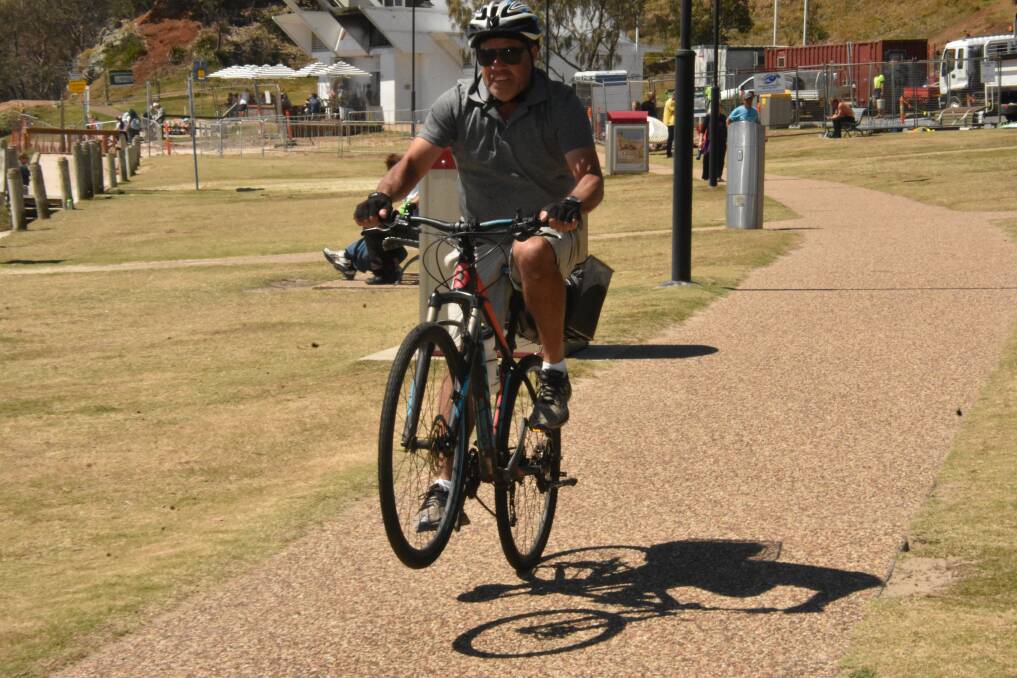 TOWN BEACH CYCLING: Robert Marr popping a wheelie during NSW Bike Week in Port Macquarie.