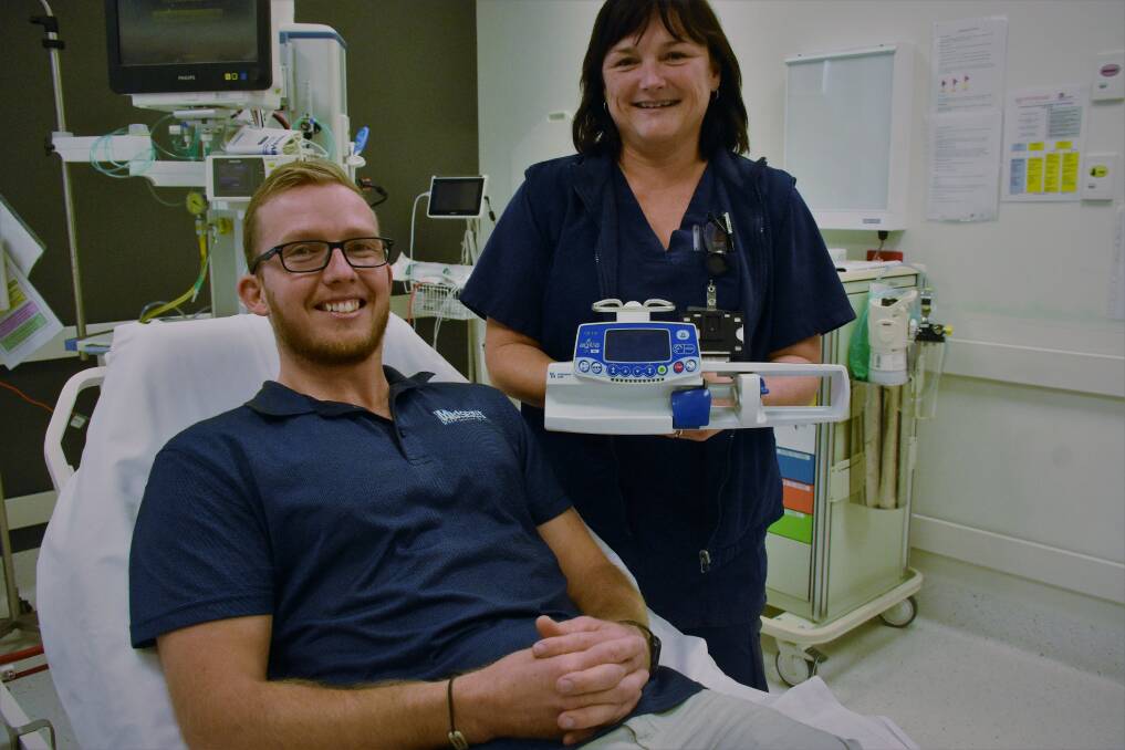 SYRINGE DRIVER: Josh Clement and Leanne Bryant with the new syringe driver.
