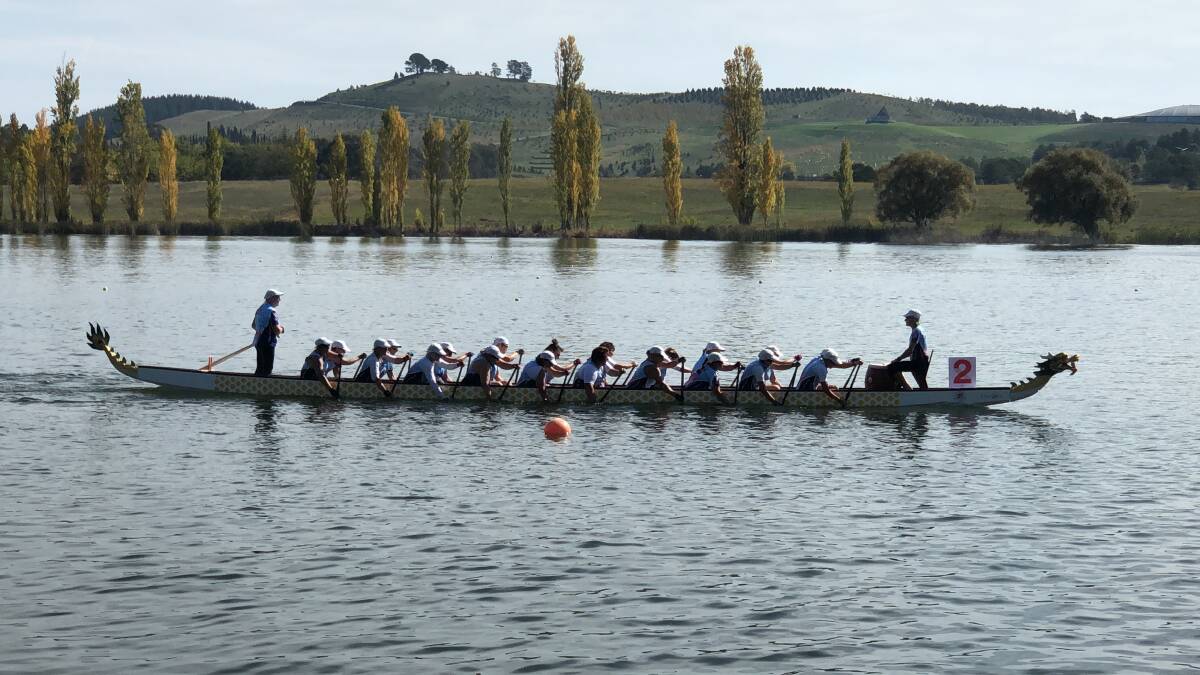 Flamin' Dragons: Teams out on the water at the national competition in Canberra. Photo: Supplied.