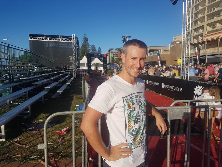 At the finish line: Robert Johnston was Port Macquarie's first local home in Ironman 70.3.