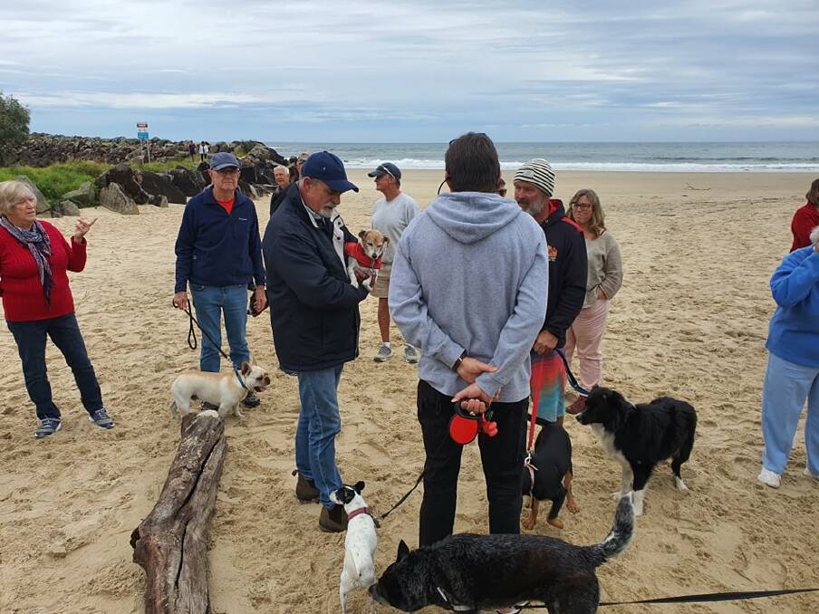 UPSETTING PROPOSAL: More than 30 people gathered at Washhouse Beach at Dunbogan on June 24 to protest making it a no-dog beach.