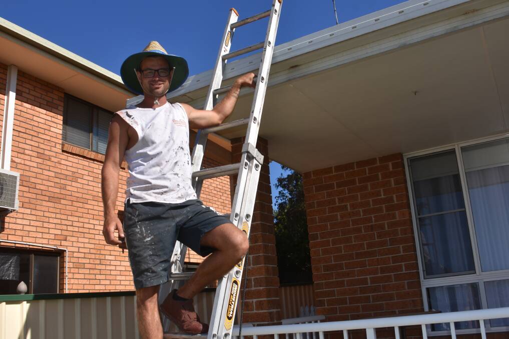 GOOD DEEDS: Port Macquarie roofer Beau South recalls the carnage from last storm season in Port Macquarie.