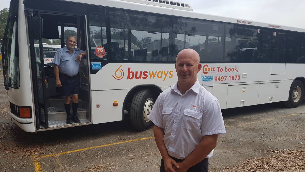 All abroad: Thrumster Cooeey service bus driver, Roberto Merola and Busways North Coast-South regional support manager Mark Lawrence.