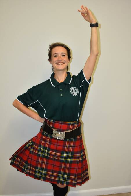 QUICK ON HER FEET: Highland dancer Joanna Buchan performing a jump.