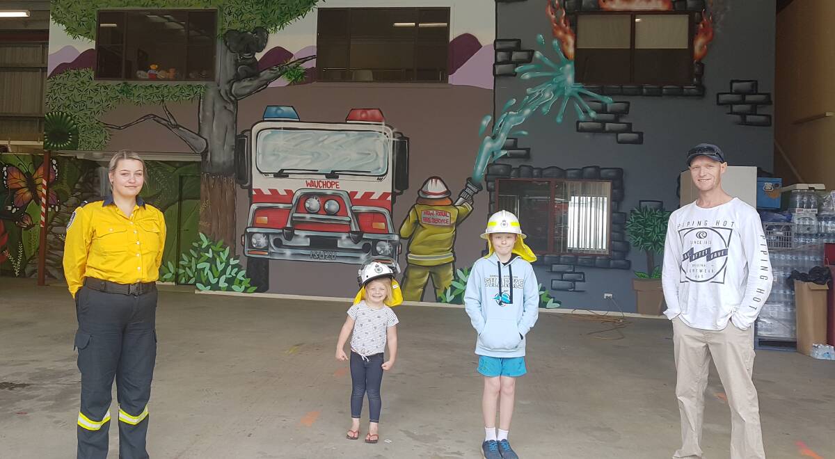 FANTASTIC ART: Tori Archer, Eloise Bishop, Tyler and Damon Moroney with the new mural in Wauchope.