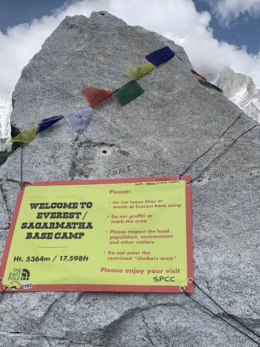Welcome travellors: A sign at base camp. Photo: Supplied.