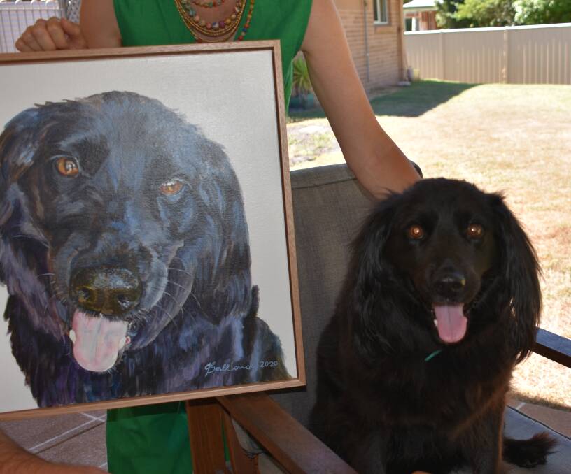MIRROR IMAGE: Storm with the donated painting.