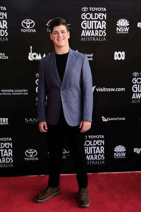 STAR QUALITY: Port Macquarie's Blake O'Connor takes as turn on the red carpet before the Golden Guitar Awards in Tamworth where he was a presenter.