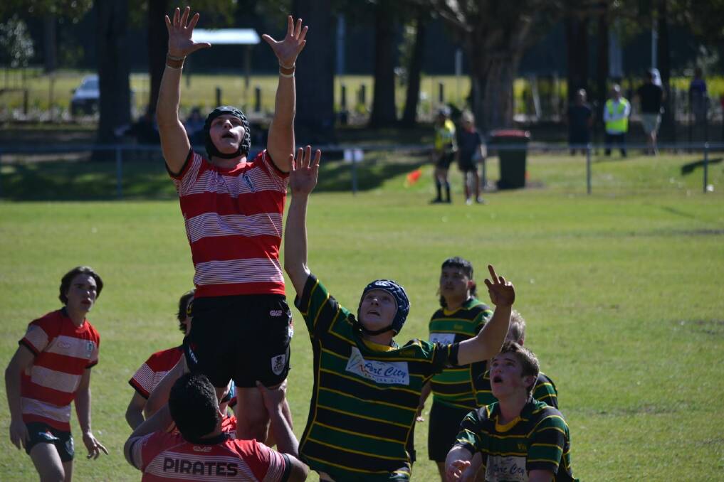 PROUD MOMENT WAITING: Pirates 18s against Hastings Valley Vikings in Port Macquarie. Photo: Supplied.