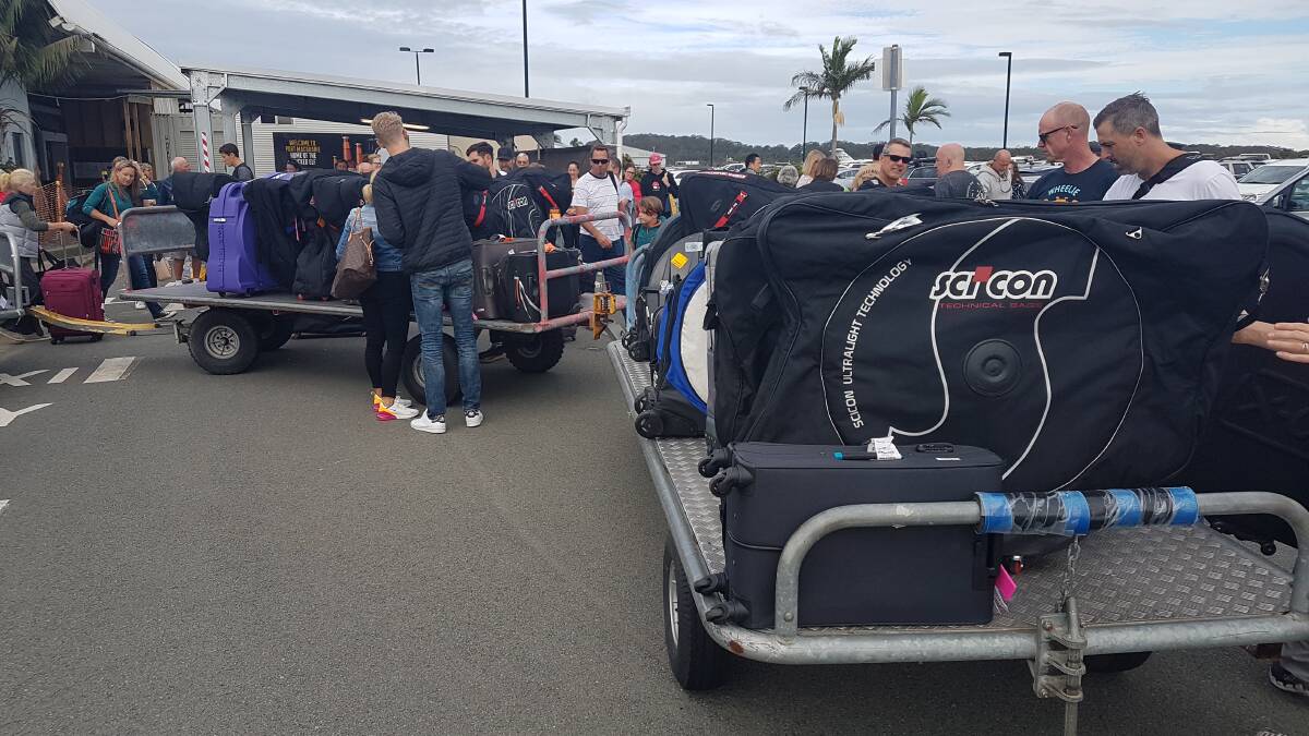 Port Macquarie Airport: Ironman bicycles fill the baggage area.