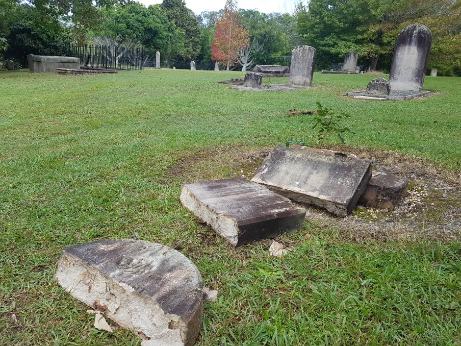 Smashed: A tombstone has been found split into three pieces after vandalism at the Port Macquarie Historical Cemetery on April 15.