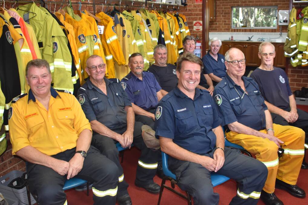 EXPERIENCED TEAM: Ex-captains and brigade firefighters with current captain Glenn Dunn (far left).