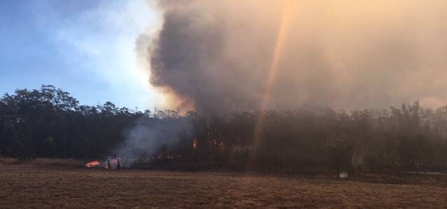 
BURNING OVERNIGHT: A bush fire in Port Macquarie. Photo: NSW Rural Fire Service Mid Coast District.