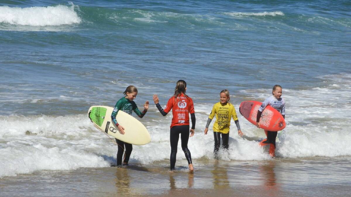 OUT OF THE SURF: Avalon Enfield (middle) with other under 12s surfers at Coffs Harbour. Photo: Soul Surfing Port Macquarie.