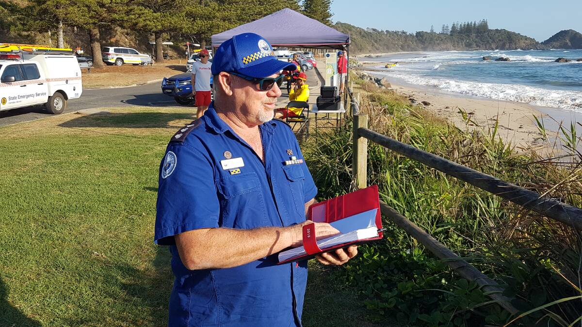 At sea search: Marine Rescue Port Macquarie unit commander Greg Davies at Shelly Beach during the search for two missing men.