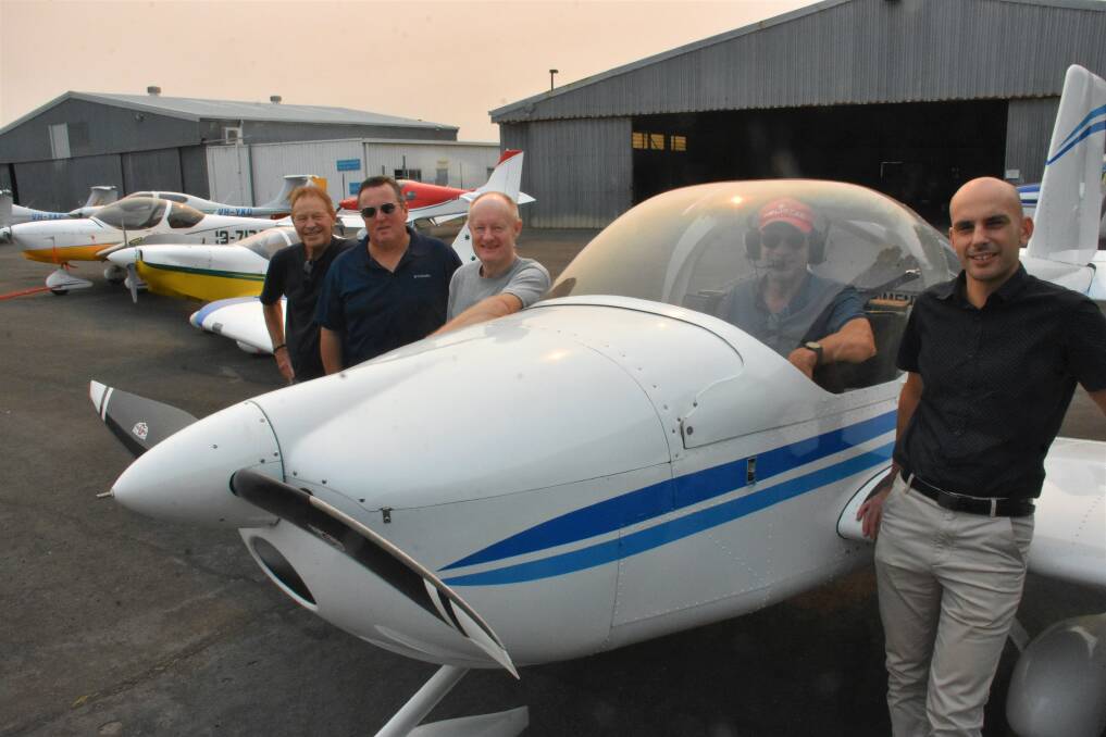 Crafty aircrafts: Port Macquarie pilots Ray Lind, Mike Bullock, Steve Woodham, Alan Bradtke and Douglas Toppazzini with some of their aircraft.