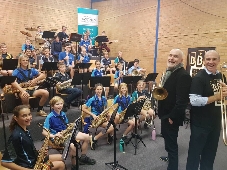 Big Band Blast: Sydney trombonist Dan Barnett with Lake Cathie Public School principal Jock Garven and local students.