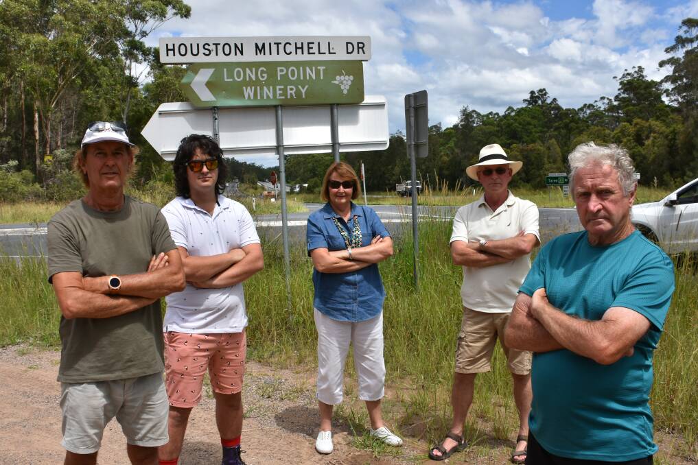 ACTION NEEDED: Peter and Keiran Rodger, Kathy Reagan, Stewart Cooper and Bob Isherwood at the Houston Mitchell Drive intersection.