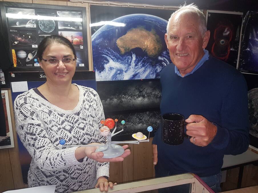 SPACE MYSTERY: Port Macquarie Astronomical Association event coodinator Alice Totonjian with vice-president Chris Ireland.