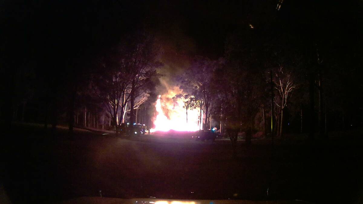Blaze in the night: A dash camera photo taken during the fire. Photo: George Coull.