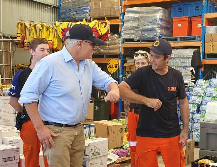 High-level visit: Prime Minister Scott Morrison meets Port Macquarie SES Unit volunteer Scott Eisenhutt.