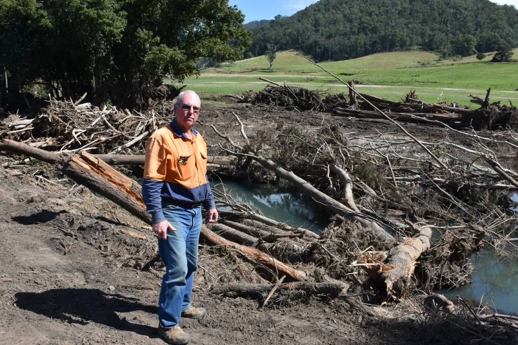 Devastation: Cattle farmer Phil Morton surveys the destruction.