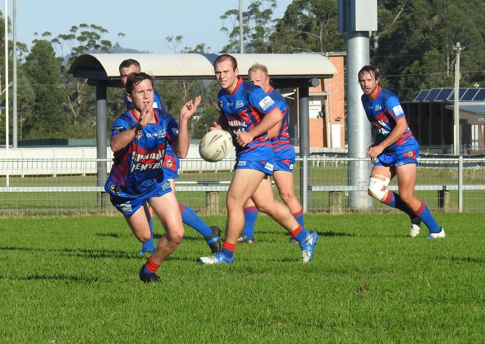 GIVE IT AIR: Ollie Pascoe delivers a pass for Wauchope Blues.