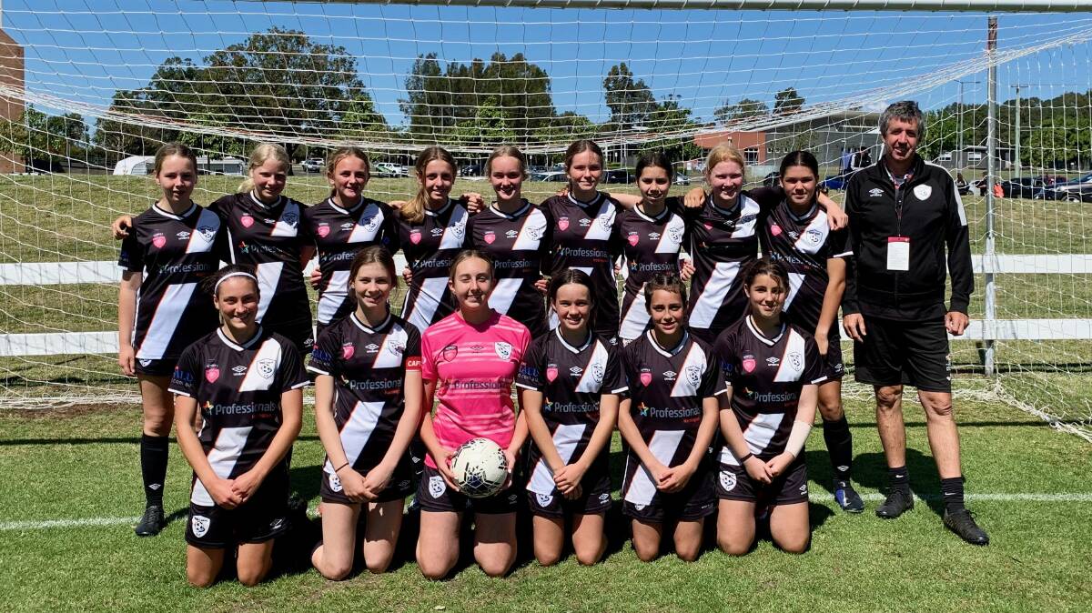 GREAT SQUAD: Mid Coast FC Women's Premier League (WPL) under 14s girls team with coach Brenton Doyle. Photo: Lisa Franklin.