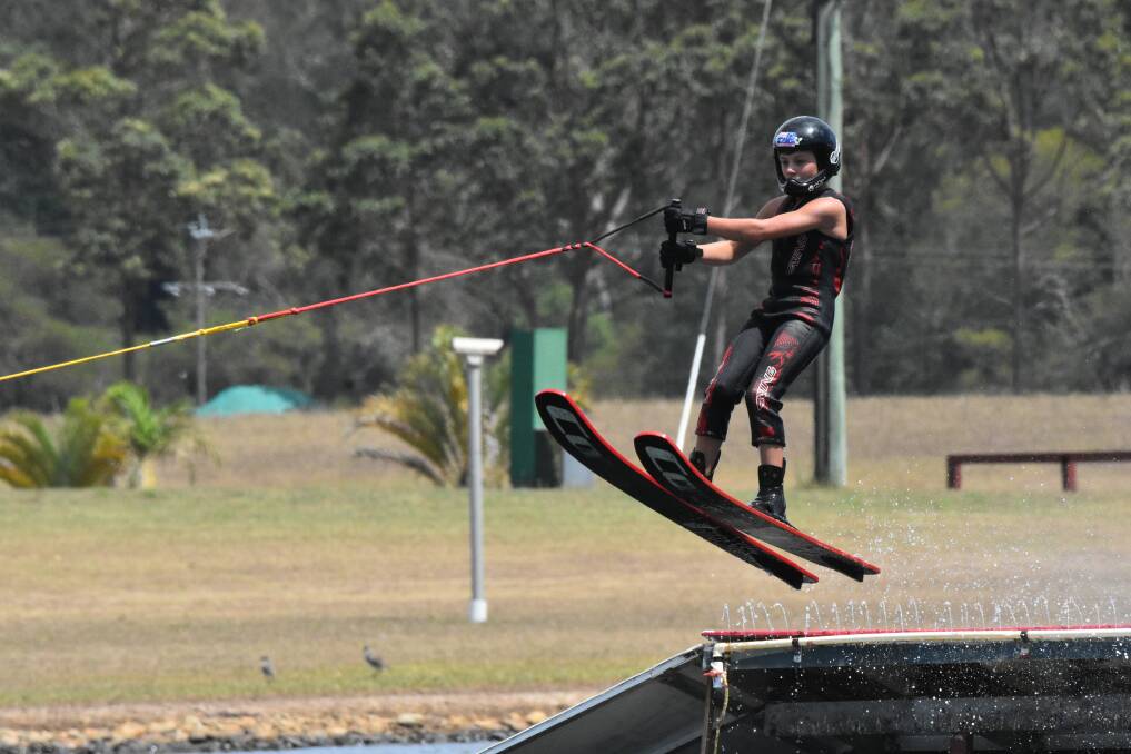 TAKING WING: Eleven year-old from Wagga, Cameron Shaw glides over a jump.