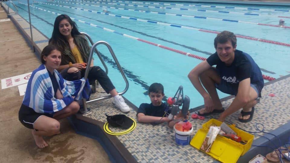TESTING PHASE: Port Macquarie students testing their aquabot in a swimming pool. Photo: Madisan Rogers, Hastings Secondary College.
