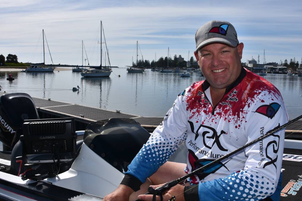 OUT ON THE WATER: Tournament director Chris Banks in Port Macquarie.