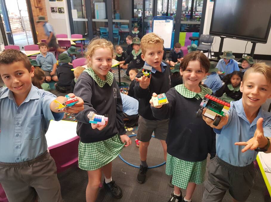 Student builders: Quinn Hancock, Stevie Wisewould, Rafferty Gordon, Ellie Nunn and Eddie Gleeson with some of their Lego vehicles.