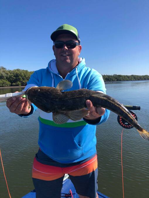 GREAT FISH: Port Macquarie angler Ben Harvey with a flathead caught on fly. Photo: Supplied.
