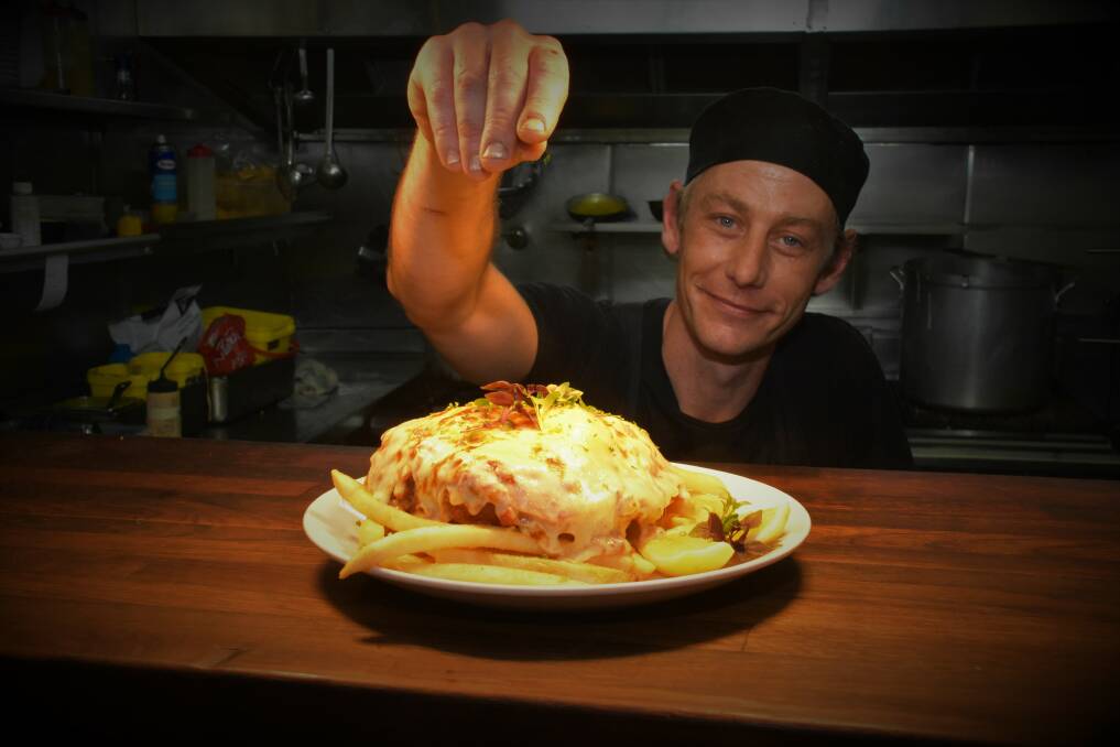 BEST PARMI BATTLE: Finnian's Tavern senior line chef Mitch O'Brien with his parmi offering for the awards.