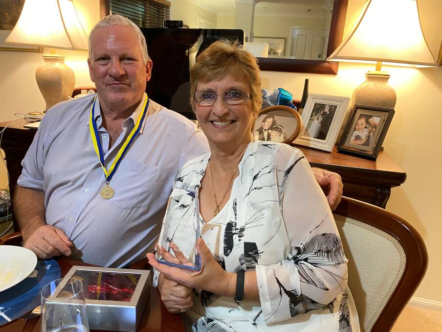 AWARDEES: New president Colin Norton and Rotarian of the Year Pam Foye. Photo: Supplied.