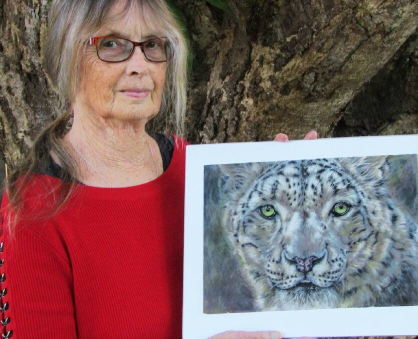 Linda Martin's portrait of Billabong Zoo's snow leopard Samarra has been selected into the 2021 Artists for Conservation exhibition and book. Photo: Supplied