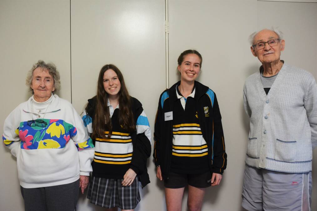 Memoirs: Year 12 students Bethany Hosking and Jasper Schultz with St Agnes' Hostel residents Margaret and Brian Kitchin.