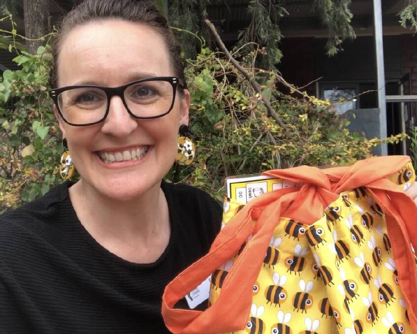 Learnign from home: The Nature School's head of primary Catherine Oehlman with one of their learning from home kit bags. Photo: Supplied
