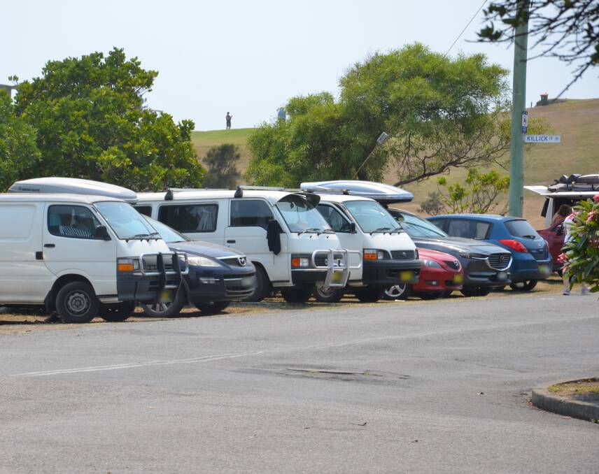 Vans parked along the golf course at Crescent Head on January 1 2020