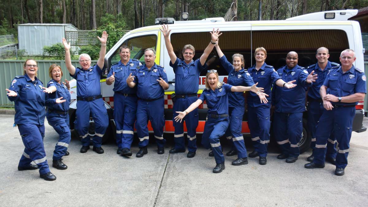 David Rine (third from left) and Ian Hamilton (fifth from left) with Laurieton Ambulance Station paramedics.