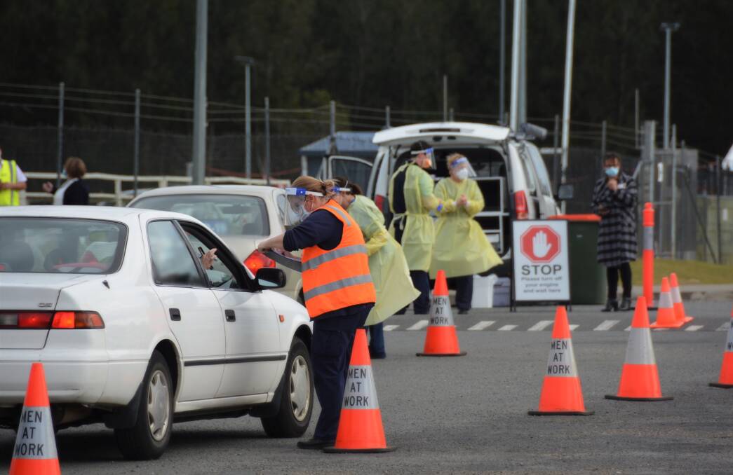 COVID-19 test: Locals turn up to get tested at the Port Macquarie Regional Stadium drive-through clinic.