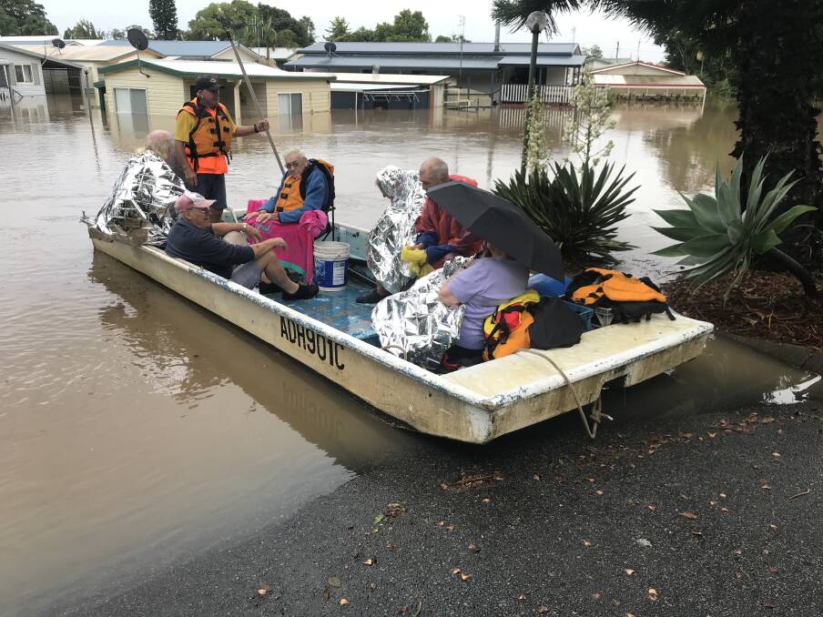 Steve Manton helping rescue residents on March 20, 2021. Photo supplied