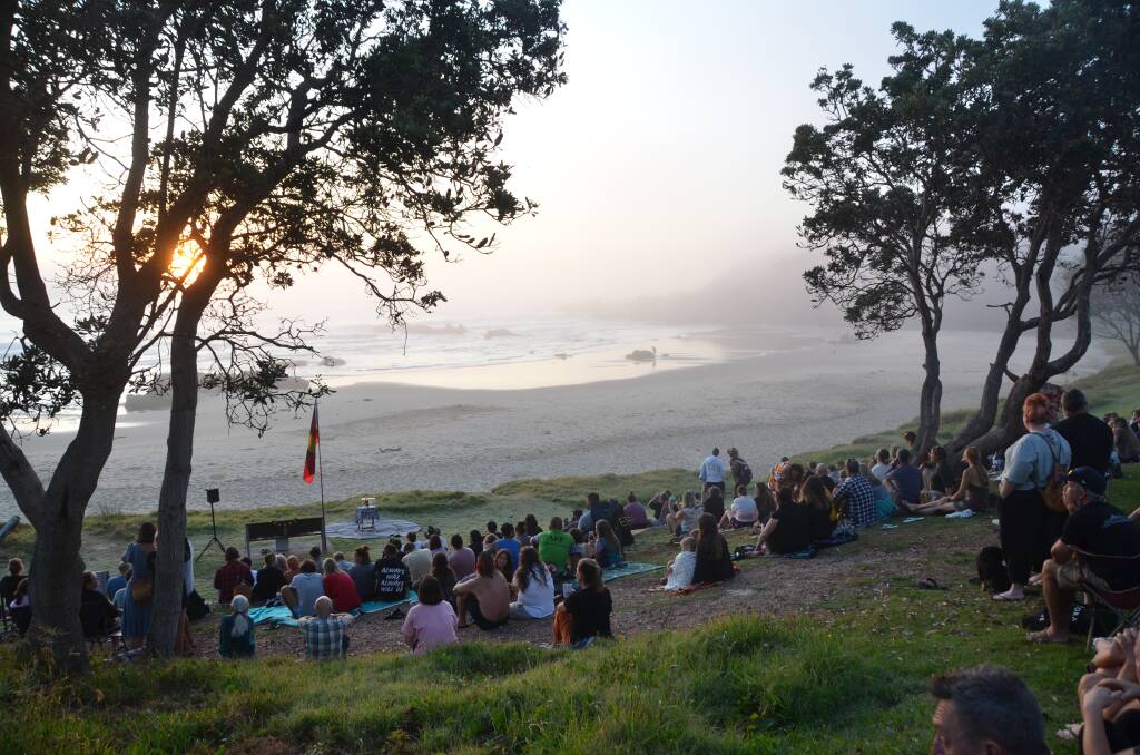 Around 100 people gathered at Oxley Beach on Thursday morning (January 26) to honour and reflect on First Nations people and history. Picture by Ruby Pascoe