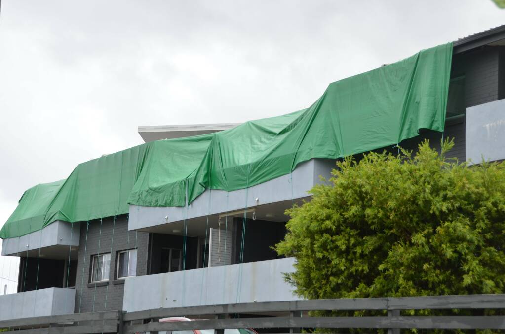 Some buildings in Port Macquarie are still needing to be fixed from February's microburst storm. Picture by Ruby Pascoe