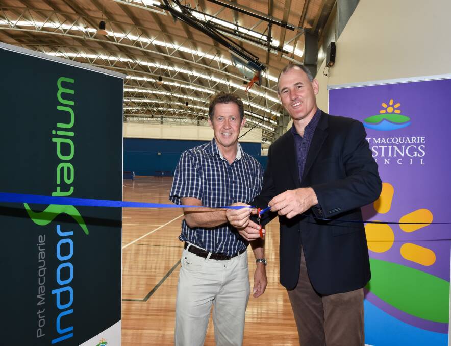 Sporting celebration: Cowper MP Luke Hartsuyker and Port Macquarie-Hastings mayor Peter Besseling officially open the expanded Port Macquarie Indoor Stadium.