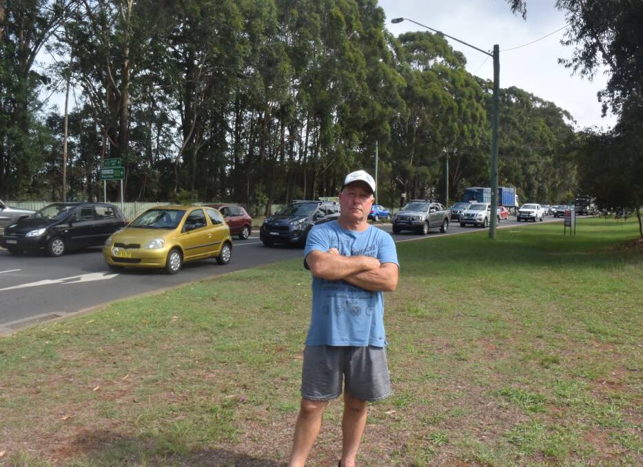 Solution required: Horse trainer John Sprague is fed up with traffic problems at the Oxley Highway/Lake Road roundabout.