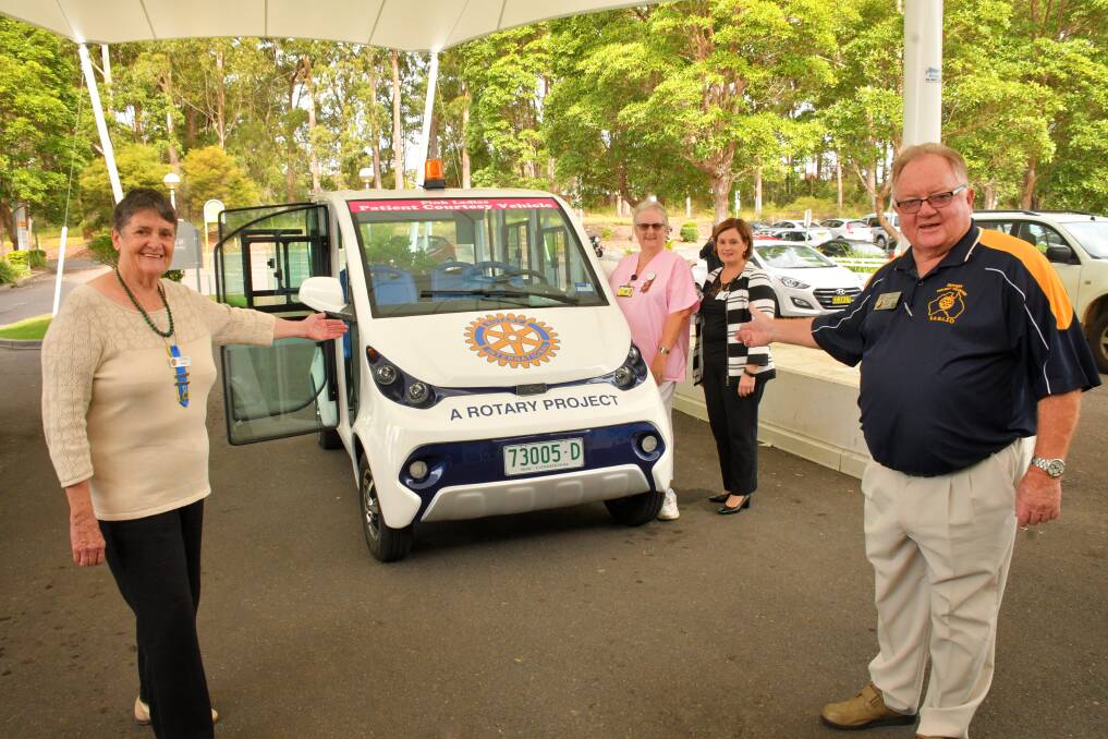 Essential service: Joan Rose, Gabby Gregory, Penelope Pink and Ray White launch the new patient/visitor transport vehicle at Port Macquarie Base Hospital.