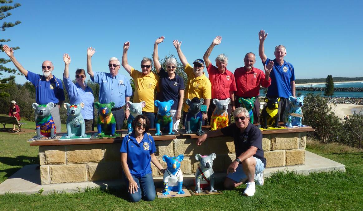 Inspire, motivate, educate: Members from Wauchope, Port Macquarie and Tacking Point Lions clubs (back) Fred Hynes, Paula Forster, Bob Forster, Mike Hussey, Donna Munro, Gordon Douglass, Gerald Billing, Mark Youngblutt, Graham McGilchrist, (front) Janice McGilchrist and Rob Bruce are impressed with the quality of the entries to the Koala Smart project.