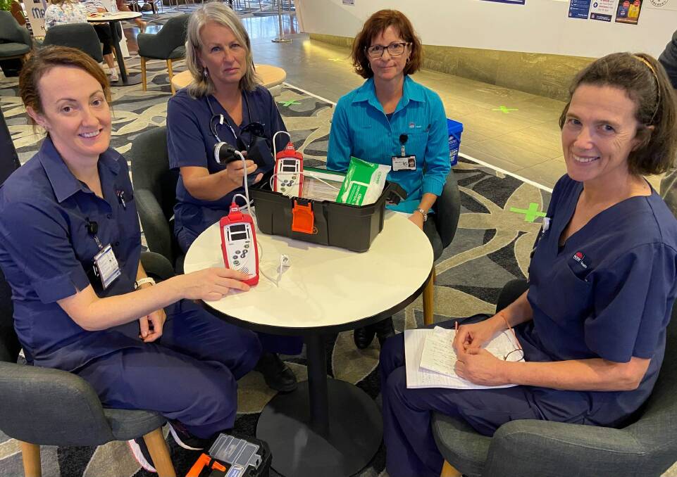 Healthcare workers Casey Luke, Andrea Pett, Michelle Cramer and Tania Arnott at the LUSC evacuation centre.