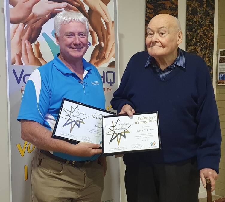 Helping others: Bill Mair and Colin O'Grady are honoured for their volunteer contributions.